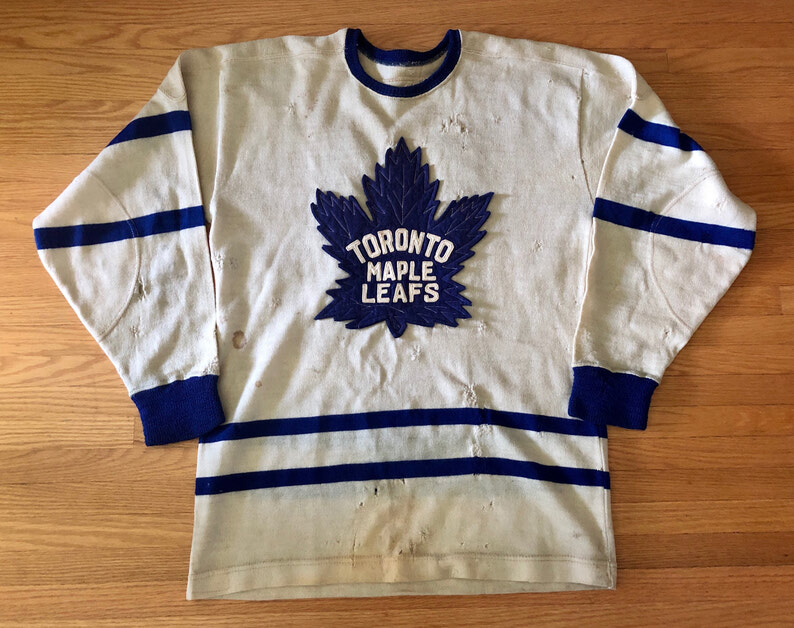 Vintage 1949 NHL All Star Game jersey with striped sleeves